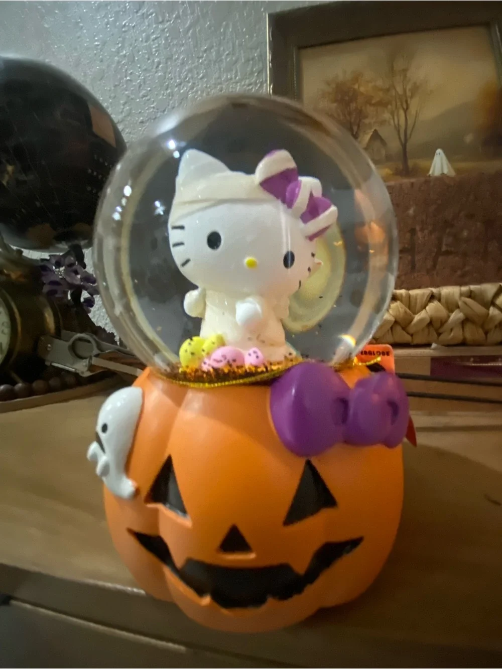 Hello Kitty Orange Pumpkin musical Snow Globe with Purple Bow Accent